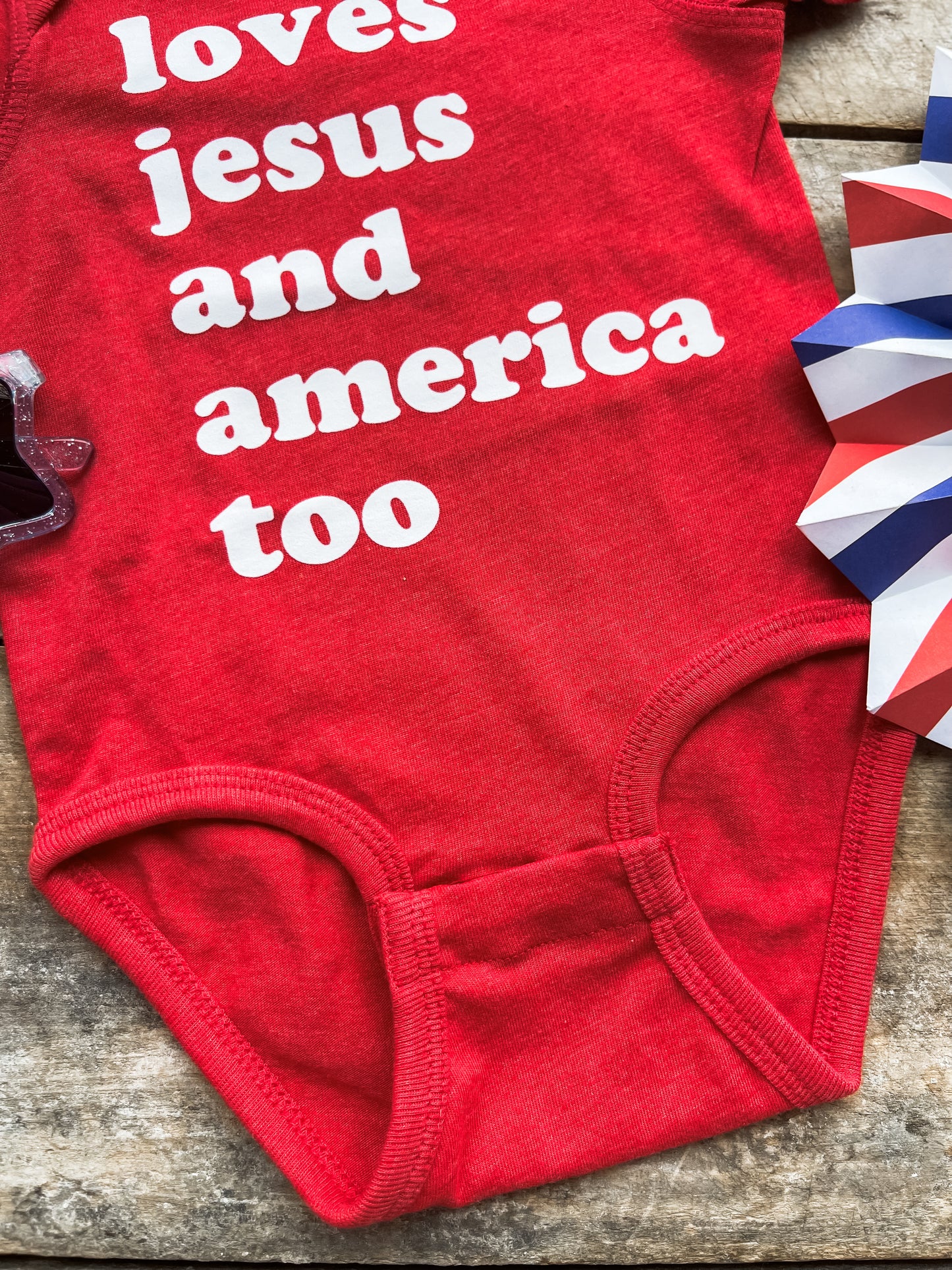 Loves Jesus and America too Infant One piece Body Suit